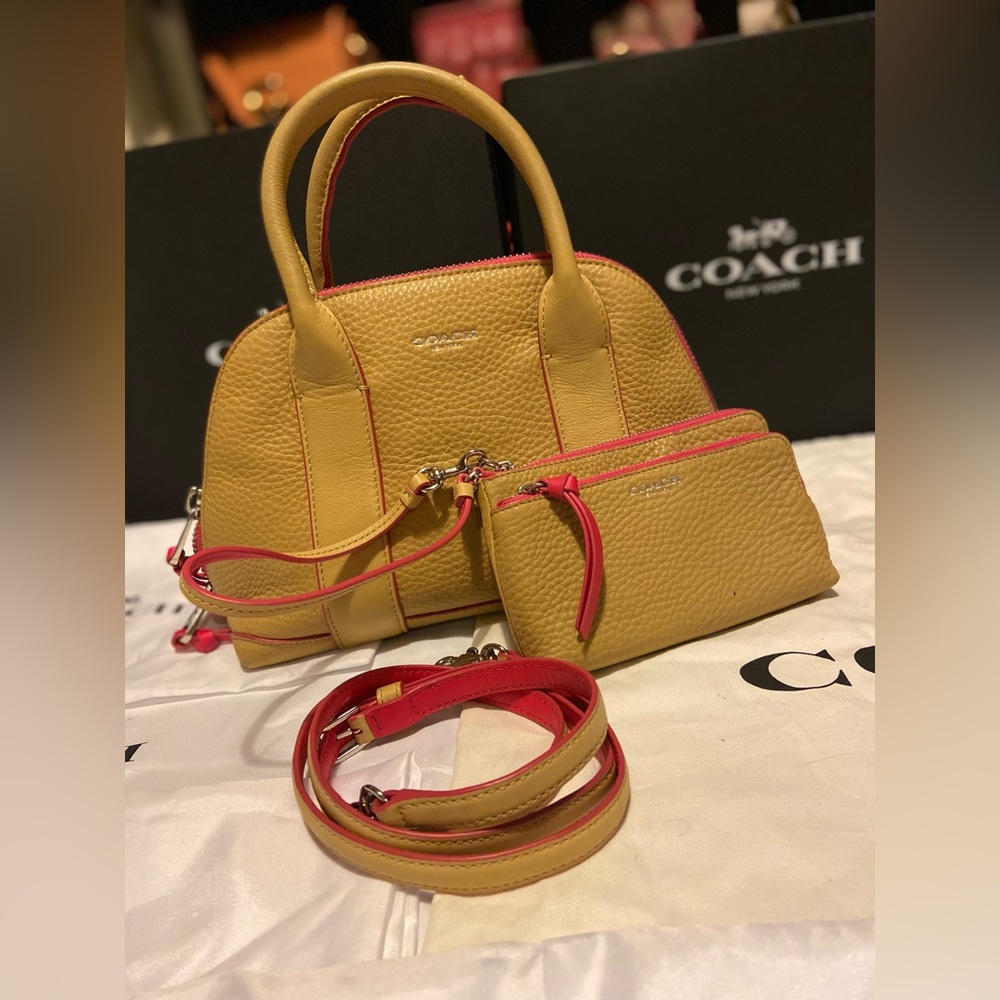 Coach Top handle purse & matching wristlet.  Beige & pink lining